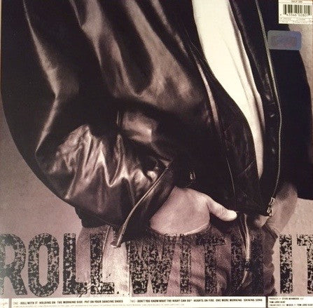Steve Winwood: Roll With It 12