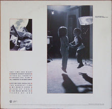 Los Lobos: By The Light Of The Moon 12"