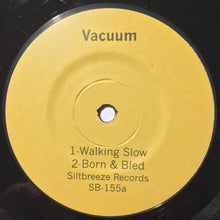 Vacuum: Walking Slow 7"