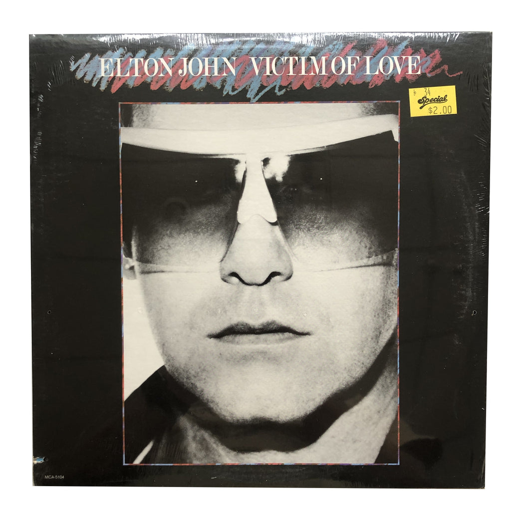 Elton John: Victim of Love 12